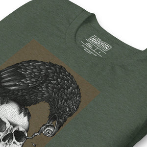 Graphite illustration of a black corvid perched on a human skull removing the eye, sprouting branch beside it, Last Look, Artificial Perdition apparel