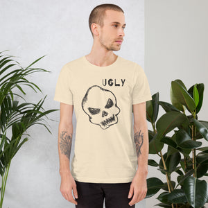 Crude hand-drawn skull with mismatched eye sockets and UGLY text in the upper corner, anti-polish graphic design, Artificial Perdition apparel