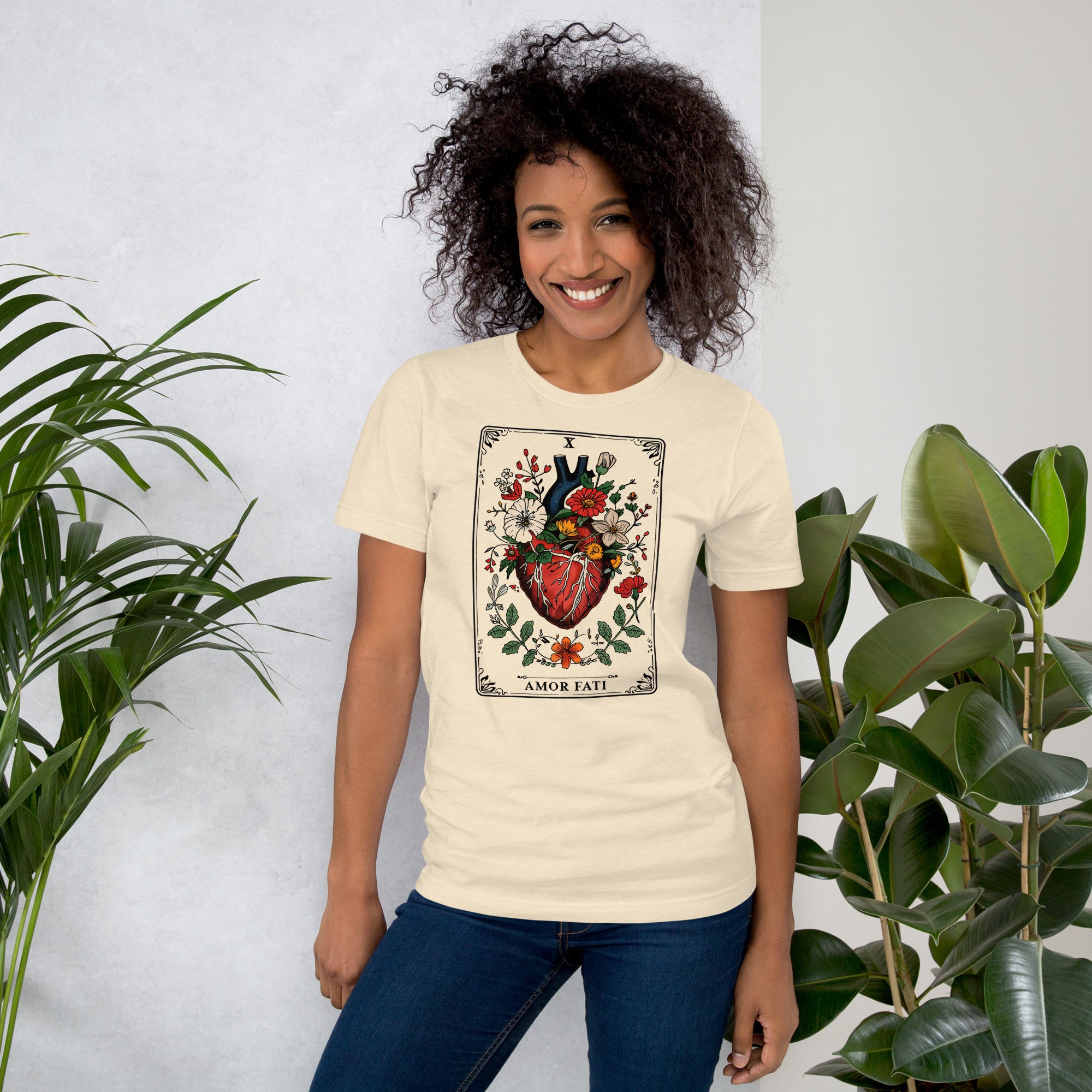 Tarot card illustration numbered X with an anatomical heart in bloom surrounded by wildflowers and vines, Amor Fati, Artificial Perdition apparel