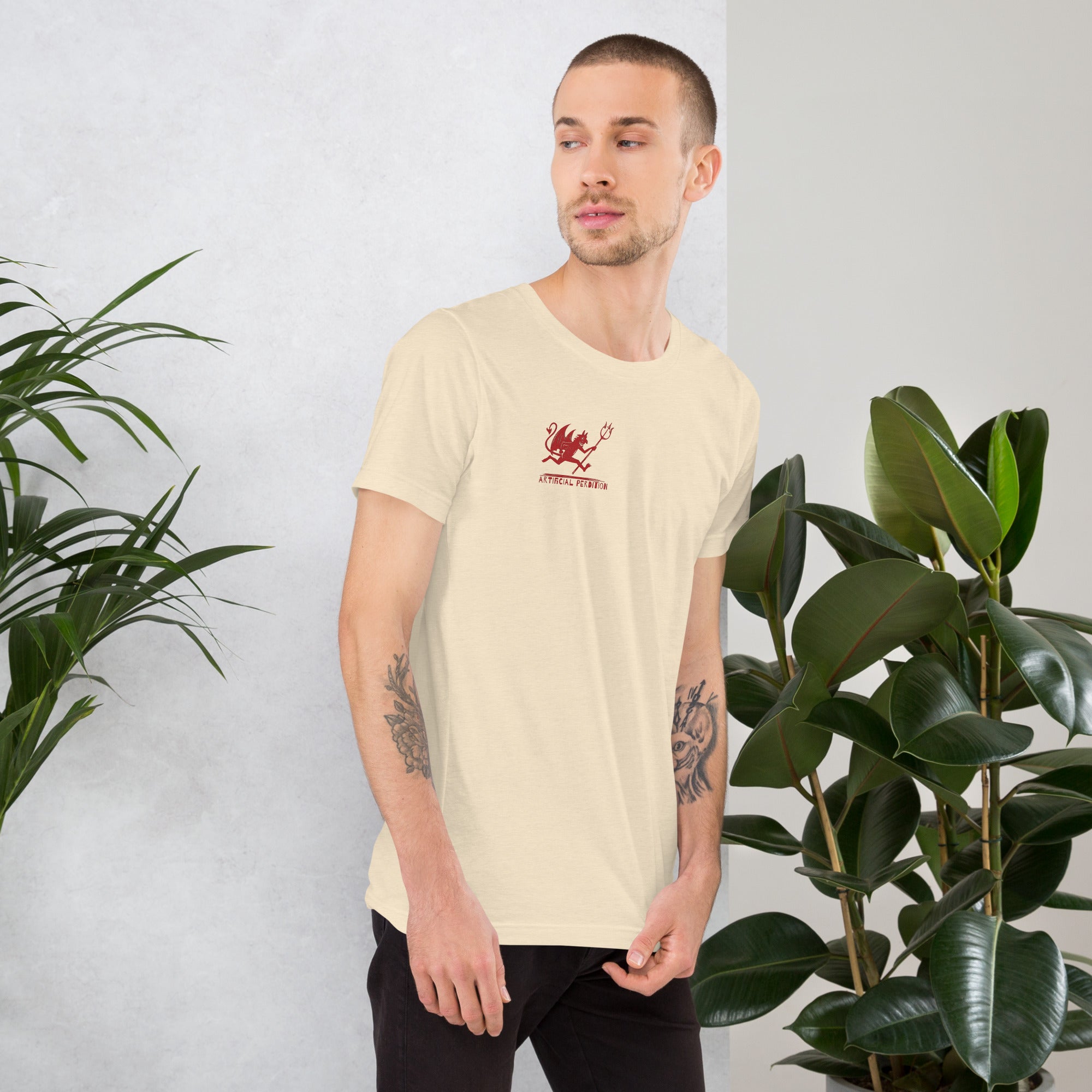 Artificial Perdition devil mascot, red illustrated devil mid-stride with trident and brand name, hand-drawn style on black, official logo tee