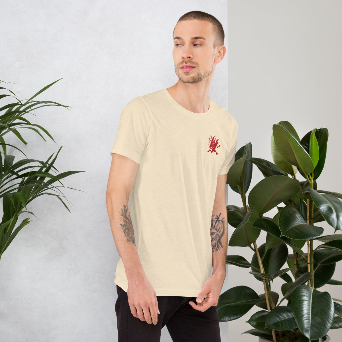 Artificial Perdition devil mascot, red illustrated devil mid-stride with trident and brand name, hand-drawn style on black, official logo tee
