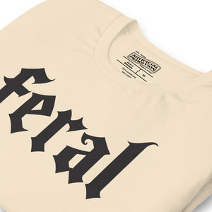 Product mockupFeral in white blackletter font on dark heather grey t-shirt, bold single word graphic design, Artificial Perdition apparel