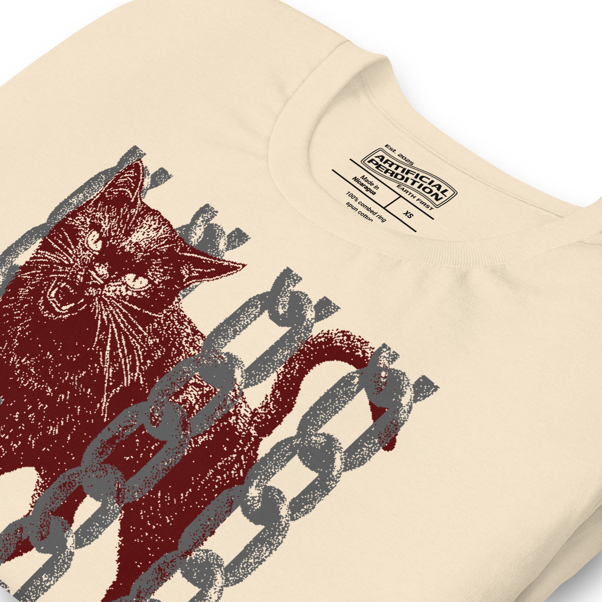 Product mockupSnarling cat breaking through chains with UNGOVERNABLE text, dithered halftone red on cream, Artificial Perdition apparel