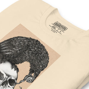 Graphite illustration of a black corvid perched on a human skull removing the eye, sprouting branch beside it, Last Look, Artificial Perdition apparel