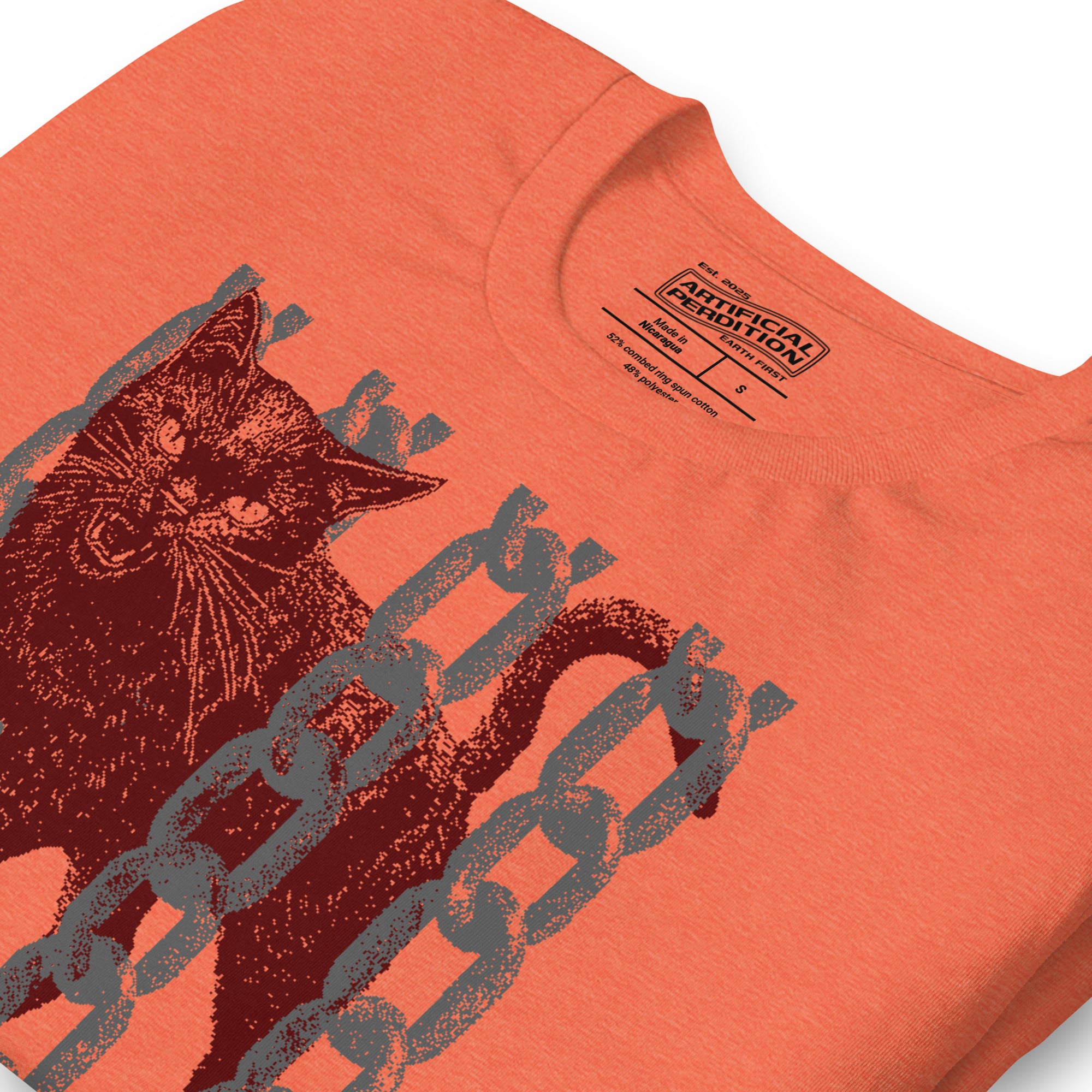 Product mockupSnarling cat breaking through chains with UNGOVERNABLE text, dithered halftone red on cream, Artificial Perdition apparel