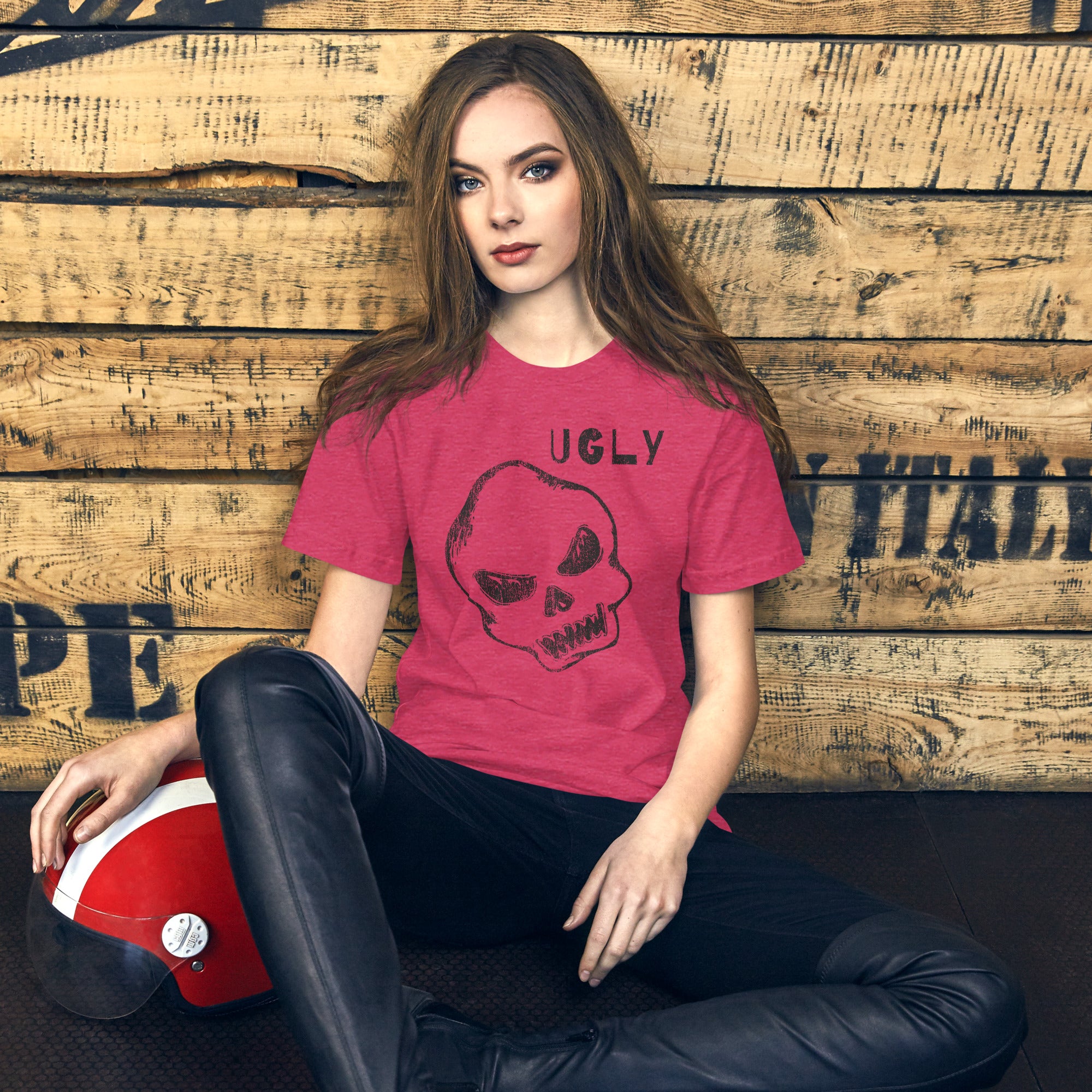 Crude hand-drawn skull with mismatched eye sockets and UGLY text in the upper corner, anti-polish graphic design, Artificial Perdition apparel