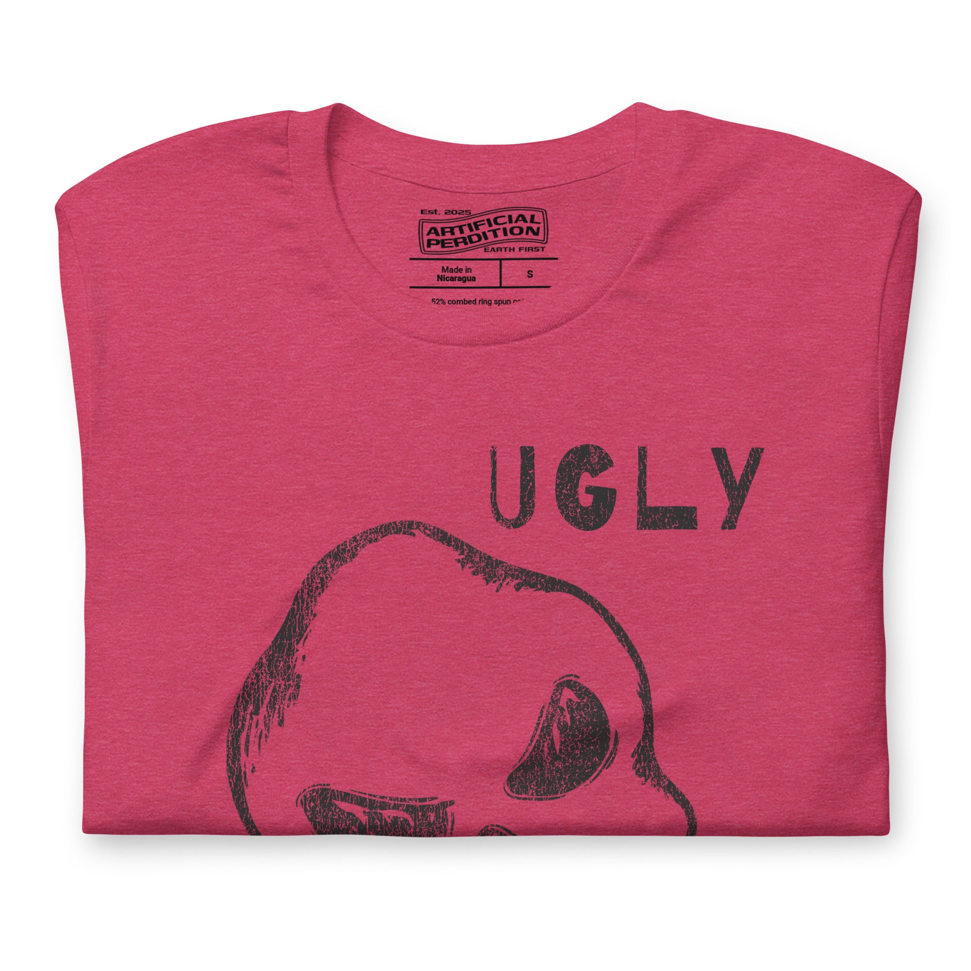 Crude hand-drawn skull with mismatched eye sockets and UGLY text in the upper corner, anti-polish graphic design, Artificial Perdition apparel