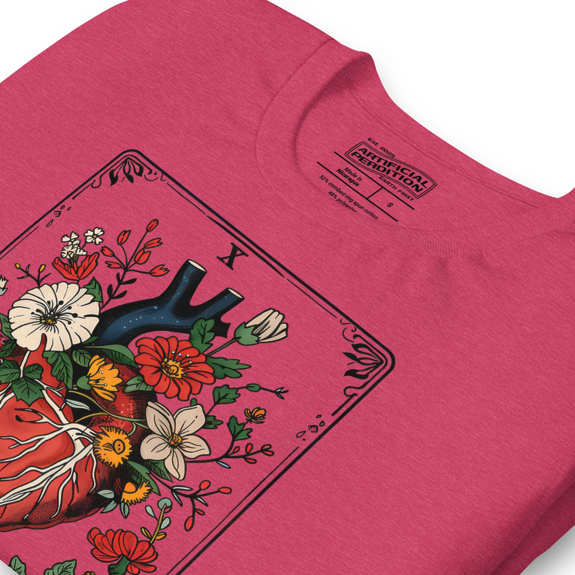 Tarot card illustration numbered X with an anatomical heart in bloom surrounded by wildflowers and vines, Amor Fati, Artificial Perdition apparelProduct mockup