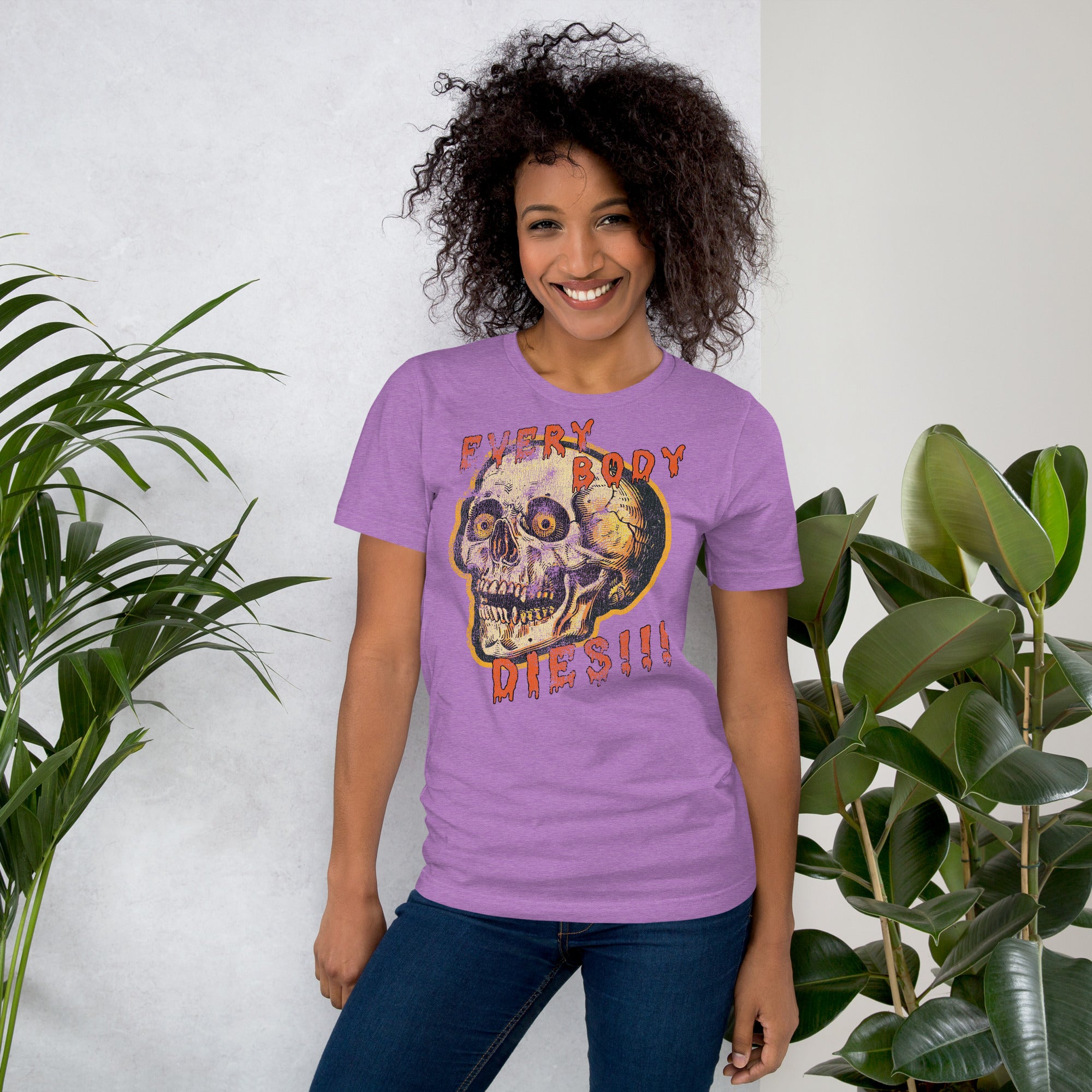 Die-cut skull with amber eyes and dripping orange horror font reading EVERY BODY DIES, vintage pulp style, Artificial Perdition apparel