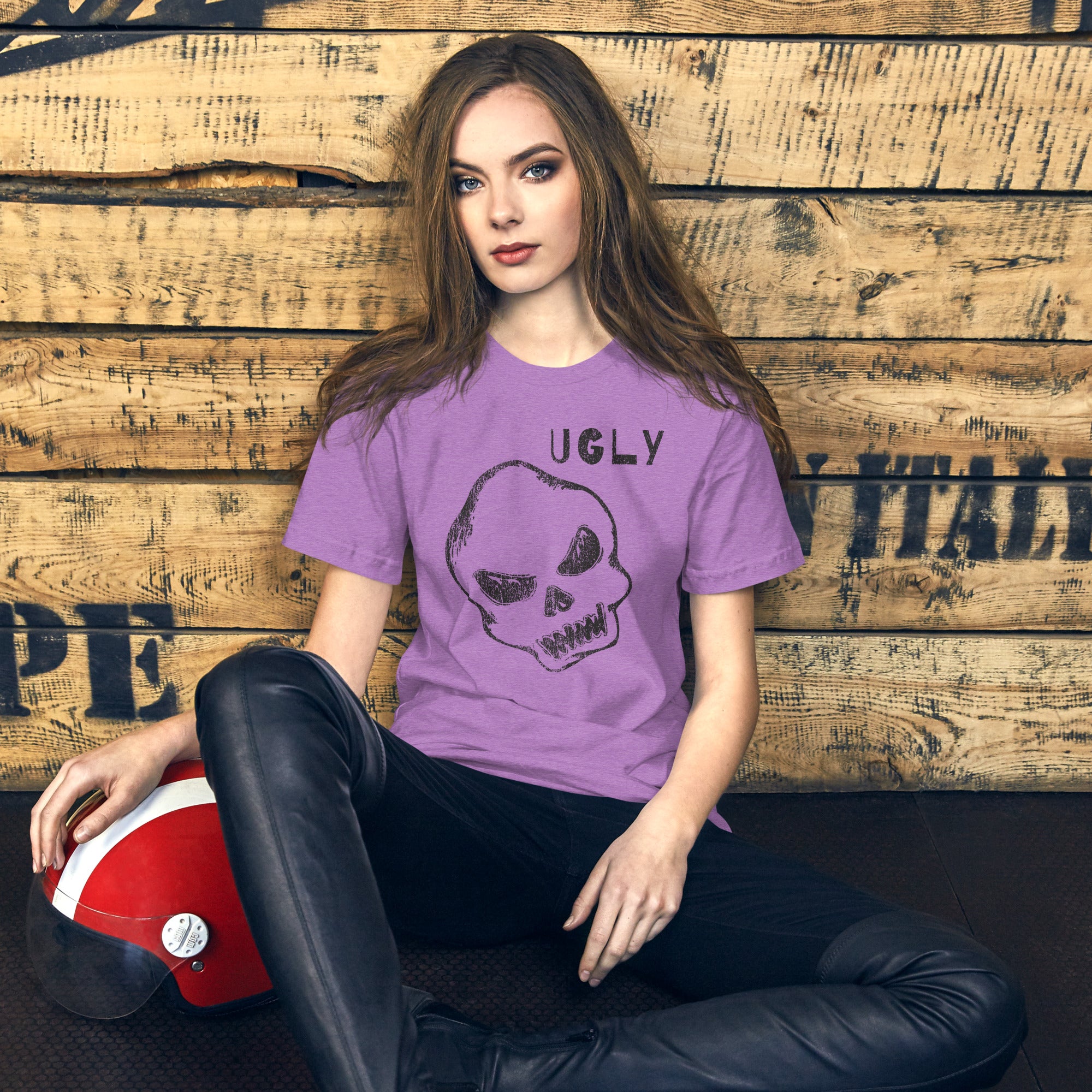 Crude hand-drawn skull with mismatched eye sockets and UGLY text in the upper corner, anti-polish graphic design, Artificial Perdition apparel