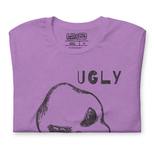 Crude hand-drawn skull with mismatched eye sockets and UGLY text in the upper corner, anti-polish graphic design, Artificial Perdition apparel