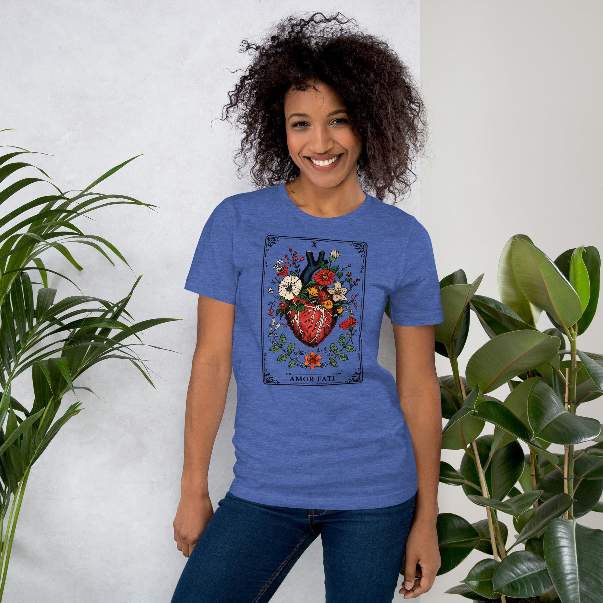 Tarot card illustration numbered X with an anatomical heart in bloom surrounded by wildflowers and vines, Amor Fati, Artificial Perdition apparel