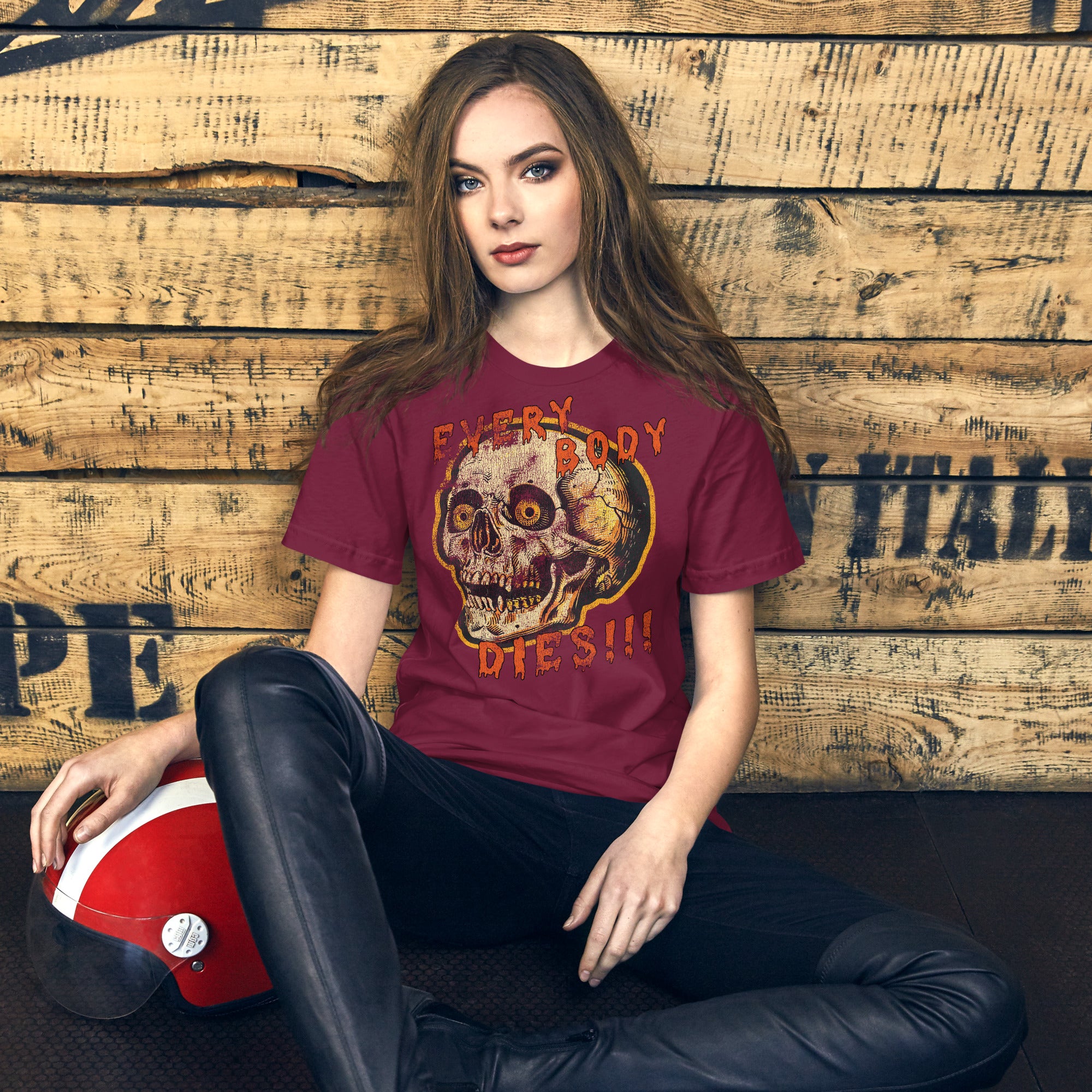 Die-cut skull with amber eyes and dripping orange horror font reading EVERY BODY DIES, vintage pulp style, Artificial Perdition apparel