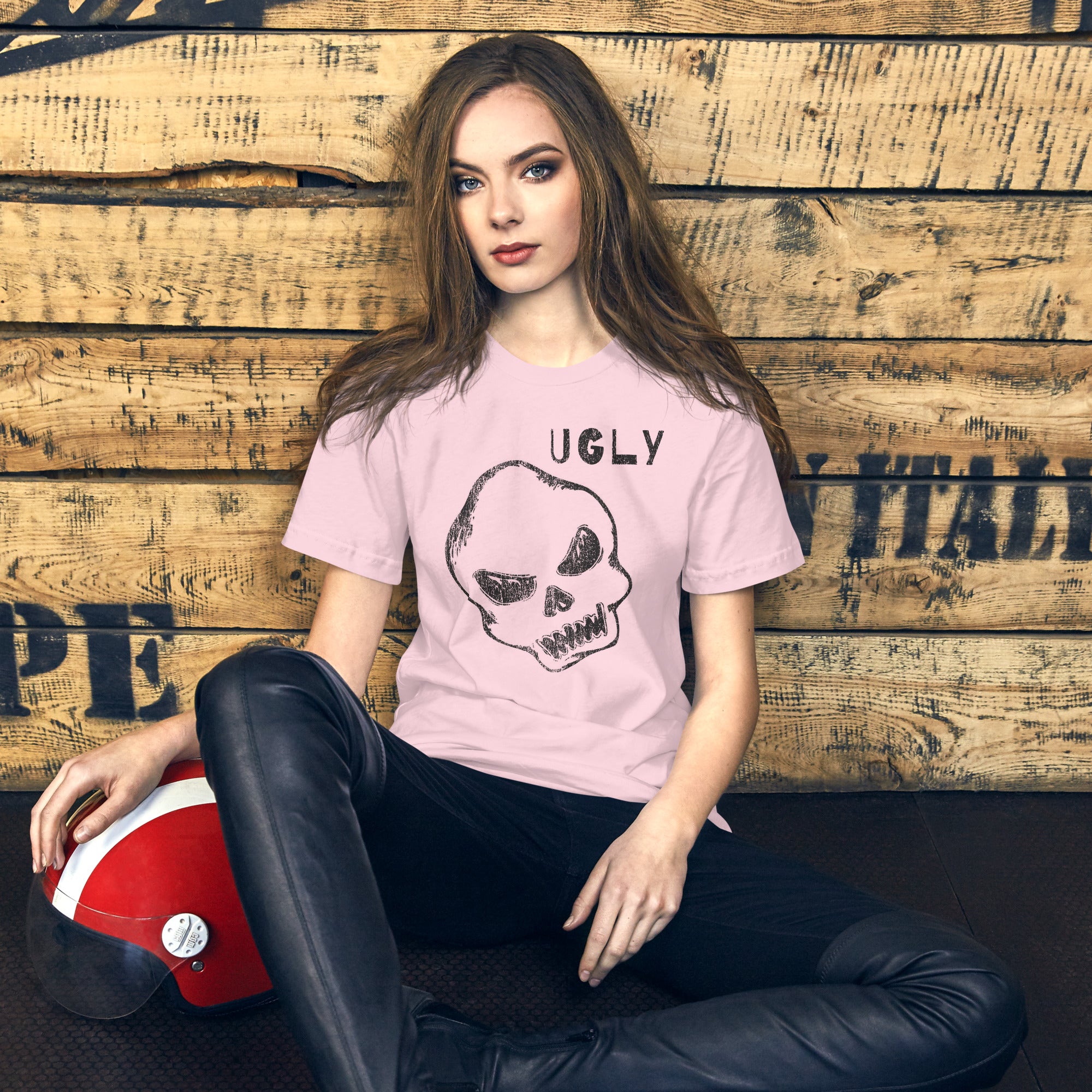 Crude hand-drawn skull with mismatched eye sockets and UGLY text in the upper corner, anti-polish graphic design, Artificial Perdition apparel
