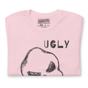 Crude hand-drawn skull with mismatched eye sockets and UGLY text in the upper corner, anti-polish graphic design, Artificial Perdition apparel