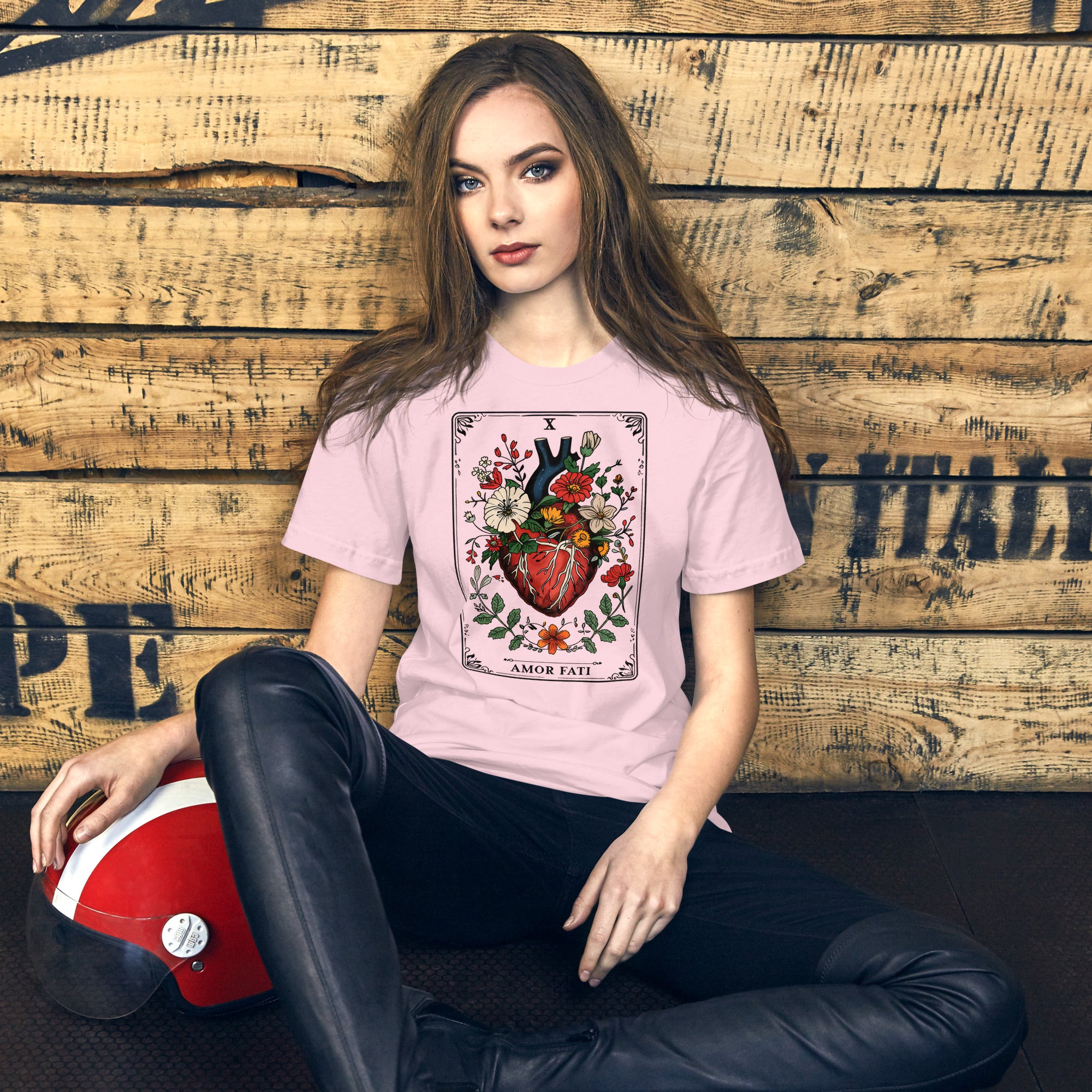 Tarot card illustration numbered X with an anatomical heart in bloom surrounded by wildflowers and vines, Amor Fati, Artificial Perdition apparel