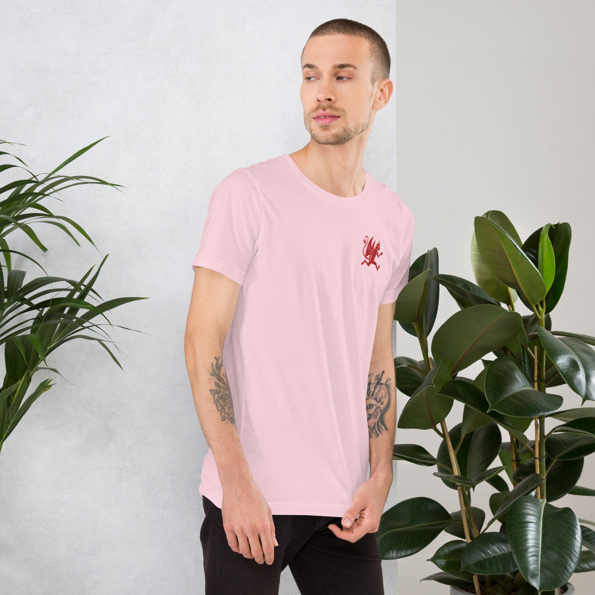 Artificial Perdition devil mascot, red illustrated devil mid-stride with trident and brand name, hand-drawn style on black, official logo tee
