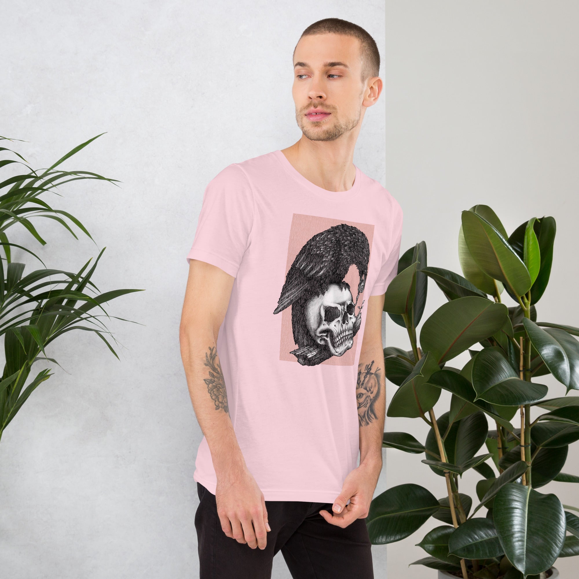 Graphite illustration of a black corvid perched on a human skull removing the eye, sprouting branch beside it, Last Look, Artificial Perdition apparel