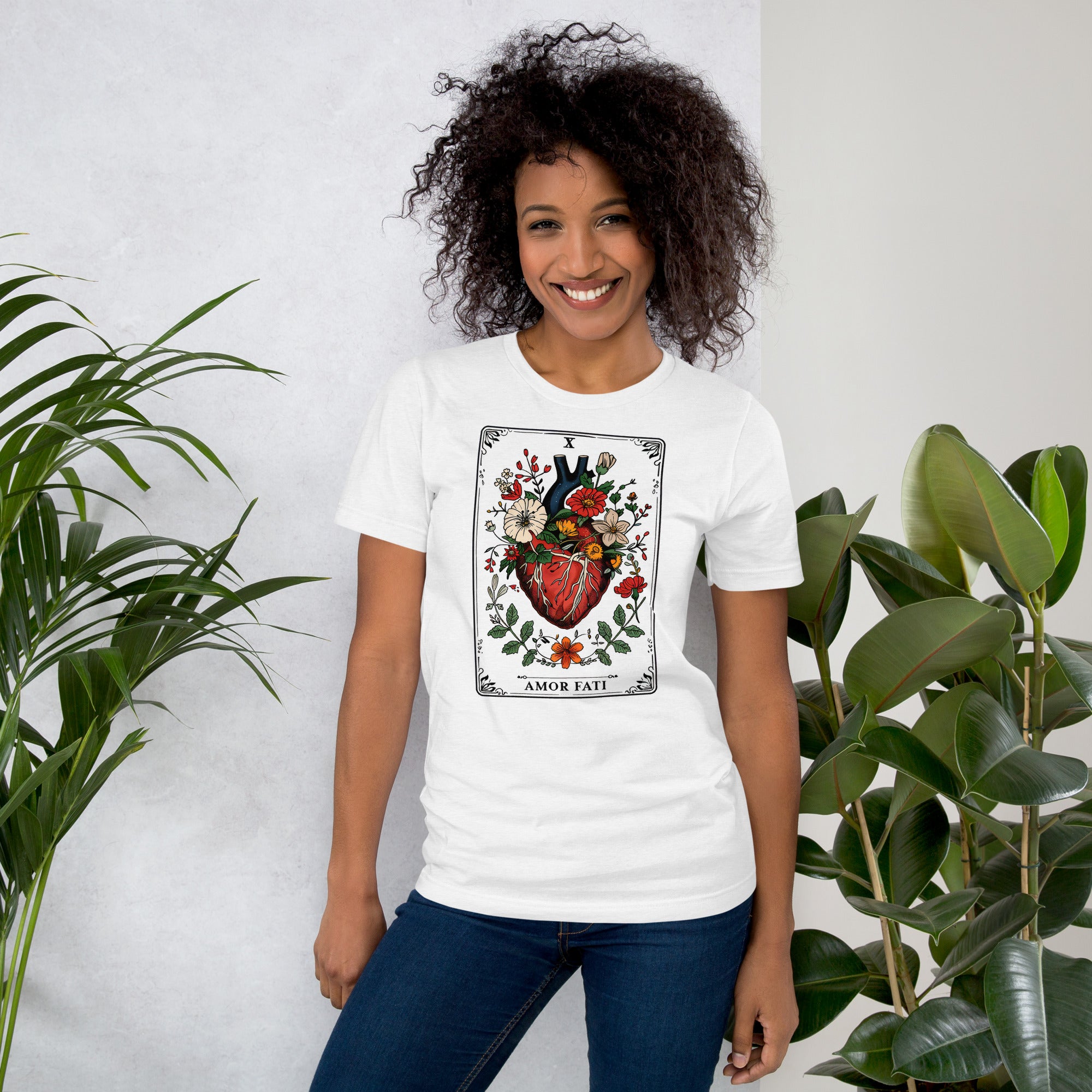 Tarot card illustration numbered X with an anatomical heart in bloom surrounded by wildflowers and vines, Amor Fati, Artificial Perdition apparel