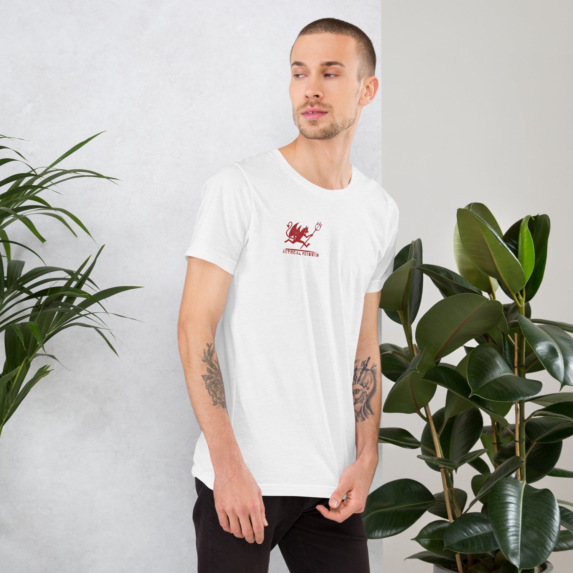 Artificial Perdition devil mascot, red illustrated devil mid-stride with trident and brand name, hand-drawn style on black, official logo tee