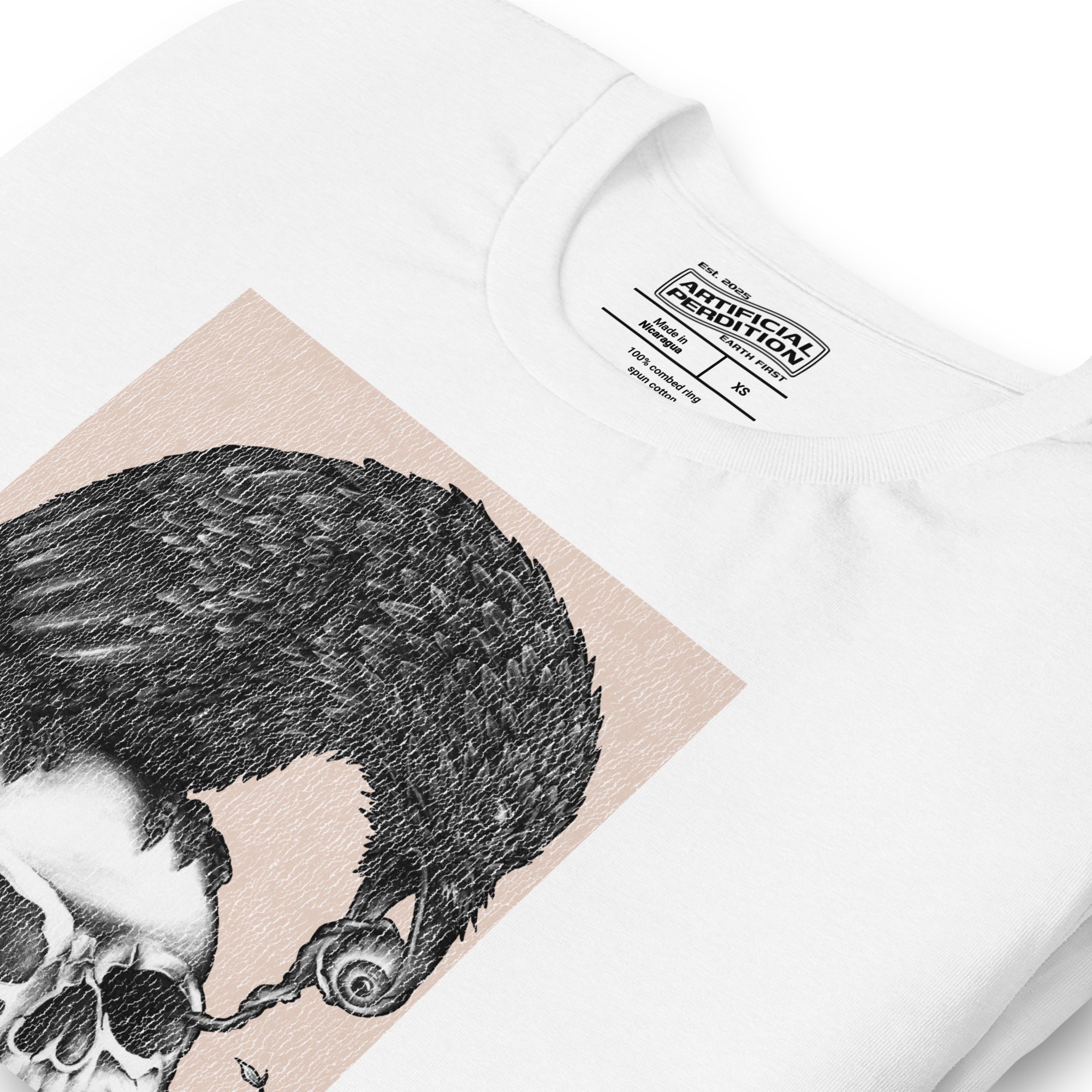 Graphite illustration of a black corvid perched on a human skull removing the eye, sprouting branch beside it, Last Look, Artificial Perdition apparel