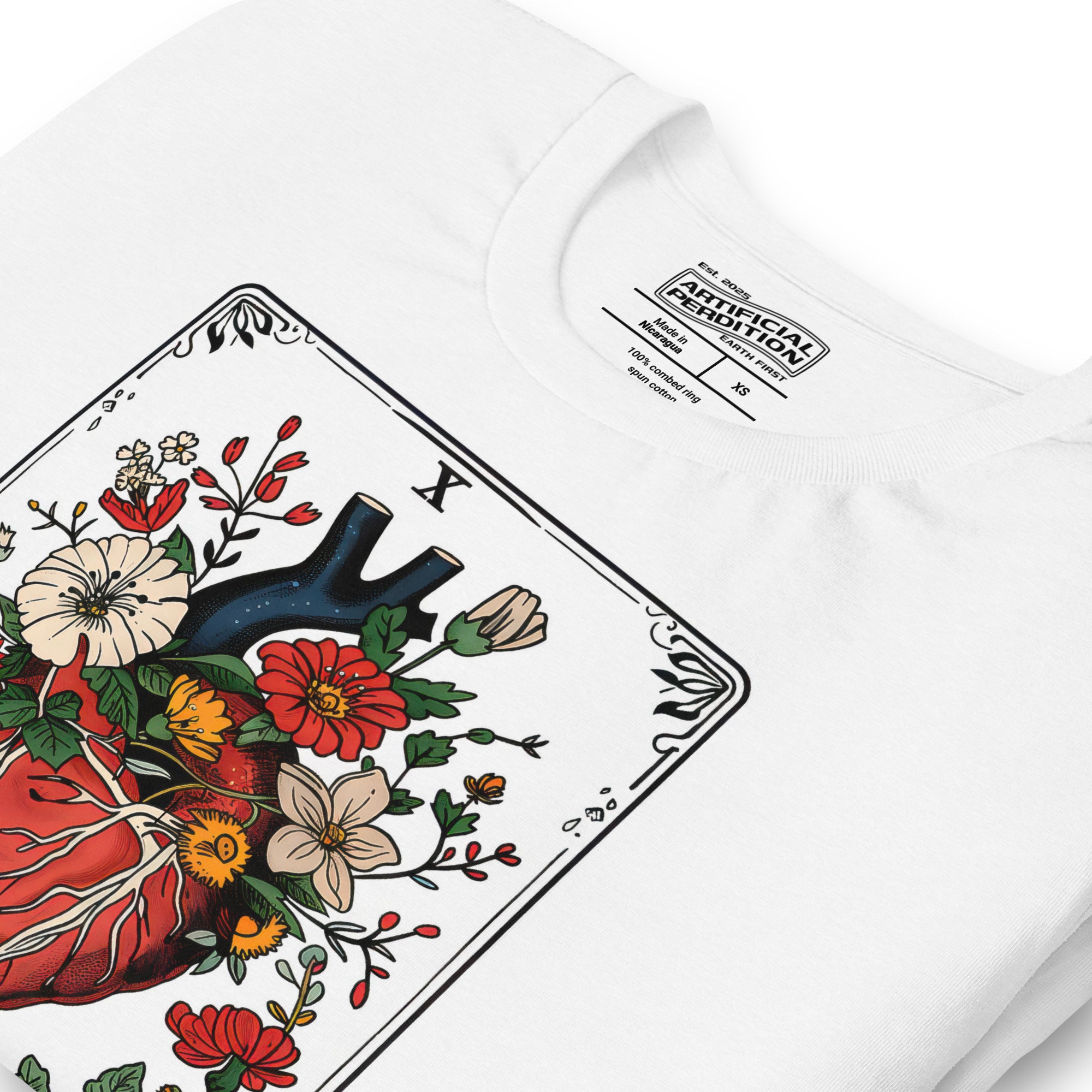 Tarot card illustration numbered X with an anatomical heart in bloom surrounded by wildflowers and vines, Amor Fati, Artificial Perdition apparel