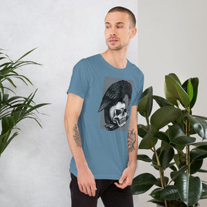 Graphite illustration of a black corvid perched on a human skull removing the eye, sprouting branch beside it, Last Look, Artificial Perdition apparel