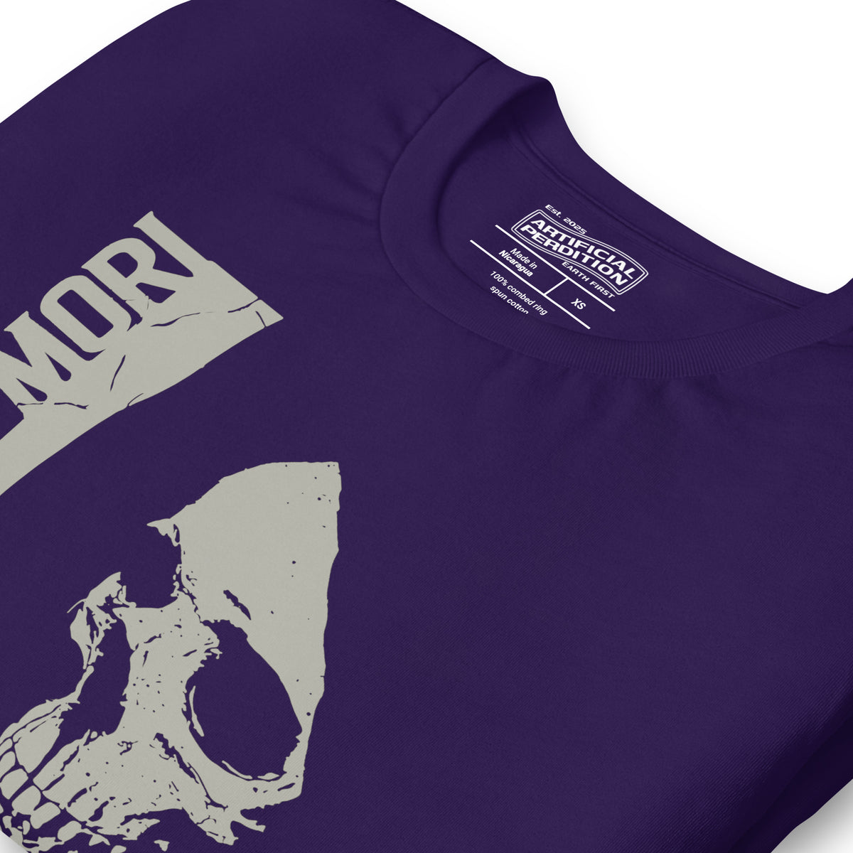 Cracked skull illustration in tombstone grey with vertical Memento Mori text and Remember Death translation, Artificial Perdition apparel