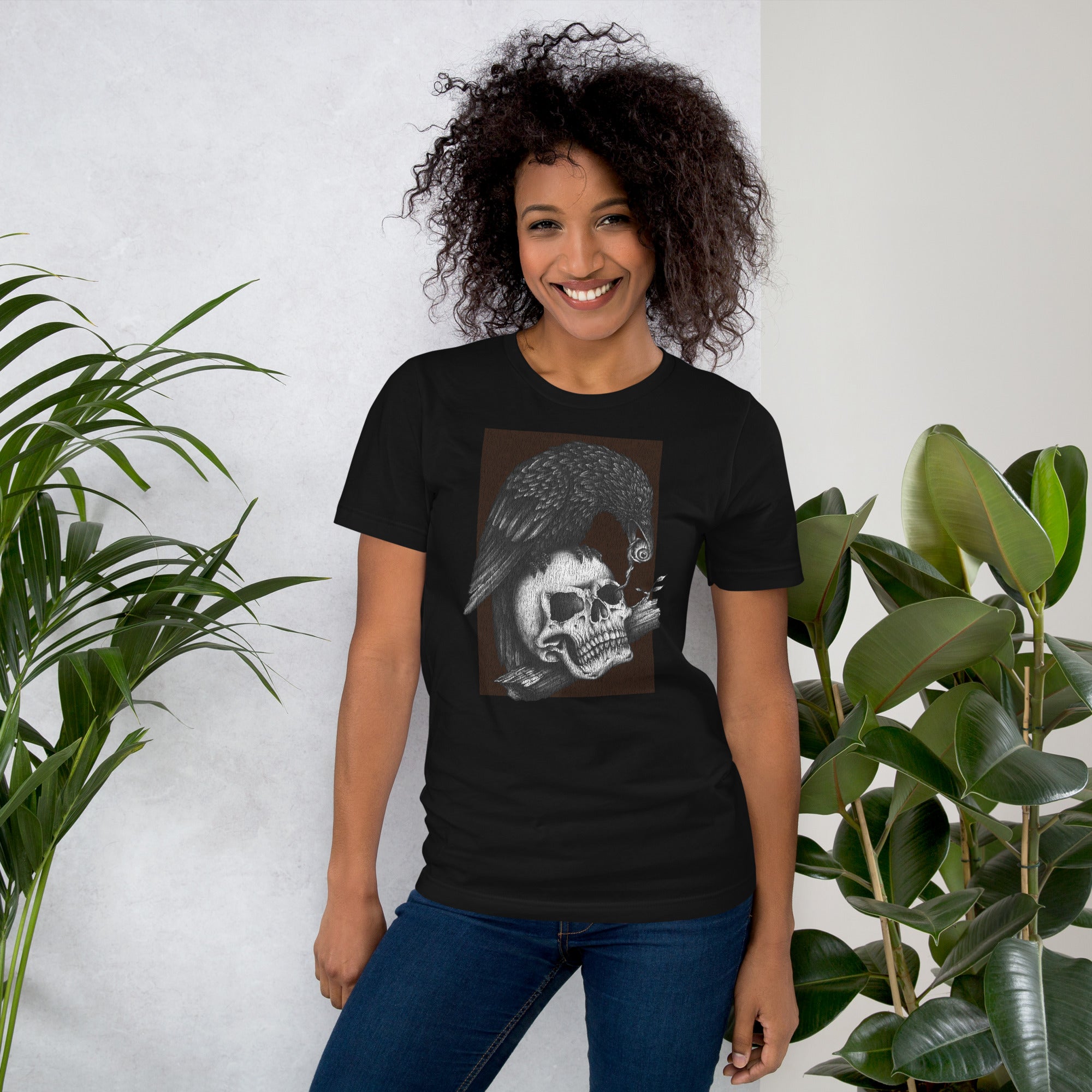 Graphite illustration of a black corvid perched on a human skull removing the eye, sprouting branch beside it, Last Look, Artificial Perdition apparel