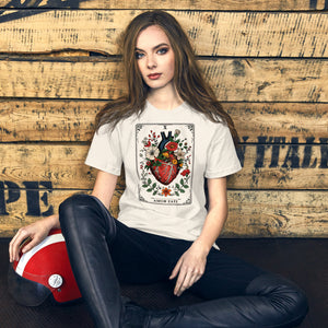 Tarot card illustration numbered X with an anatomical heart in bloom surrounded by wildflowers and vines, Amor Fati, Artificial Perdition apparel