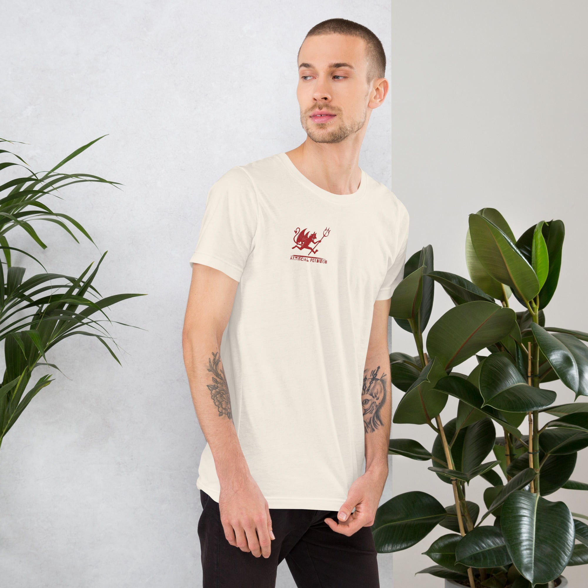 Artificial Perdition devil mascot, red illustrated devil mid-stride with trident and brand name, hand-drawn style on black, official logo tee