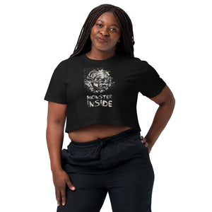 Black cropped cotton t-shirt featuring horned monster inside a ritual circle with mystical script and “Monster Inside” text.