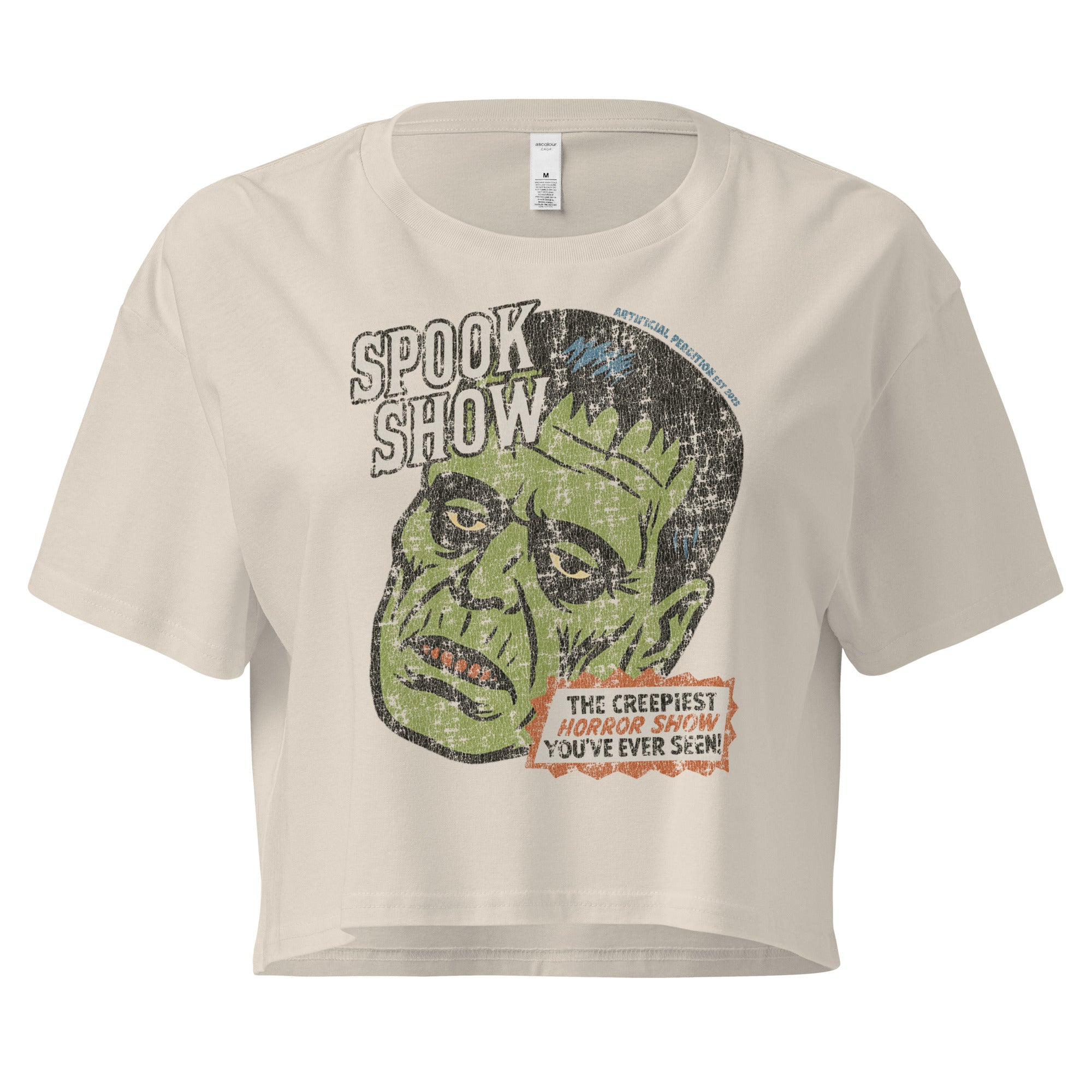 A distressed Frankenstein head with “Spook Show” on premium bone crop top.