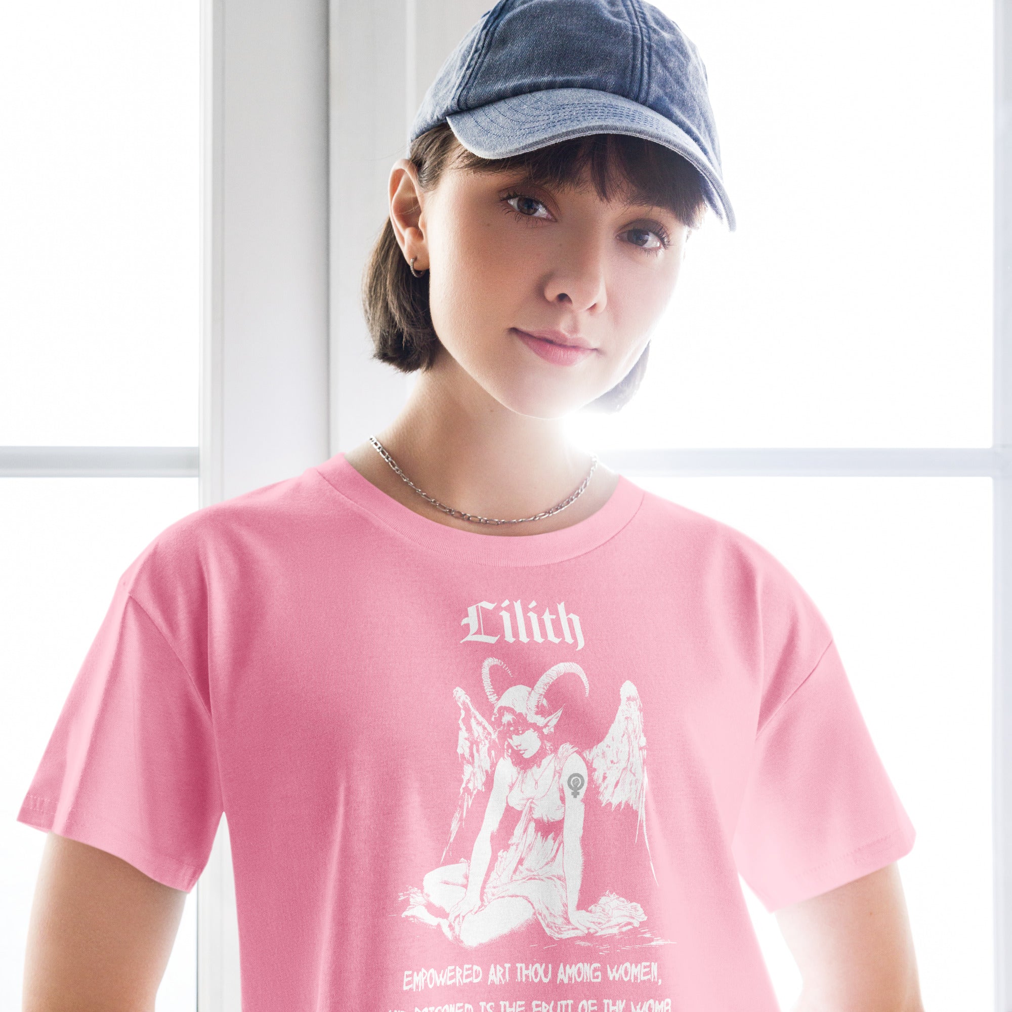 Black cropped cotton t-shirt featuring a black-and-white Lilith illustration with horns, wings, and gothic lettering.