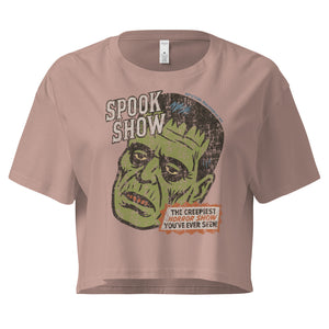 A distressed Frankenstein head with “Spook Show” on premium hazy pink crop top.
