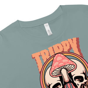 Cropped tee featuring a split skull and mushroom design with melting psychedelic color and smiley faces. Soft combed cotton, eco-friendly inks, playful surreal vibe.