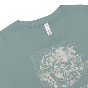 Black cropped cotton t-shirt featuring horned monster inside a ritual circle with mystical script and “Monster Inside” text.