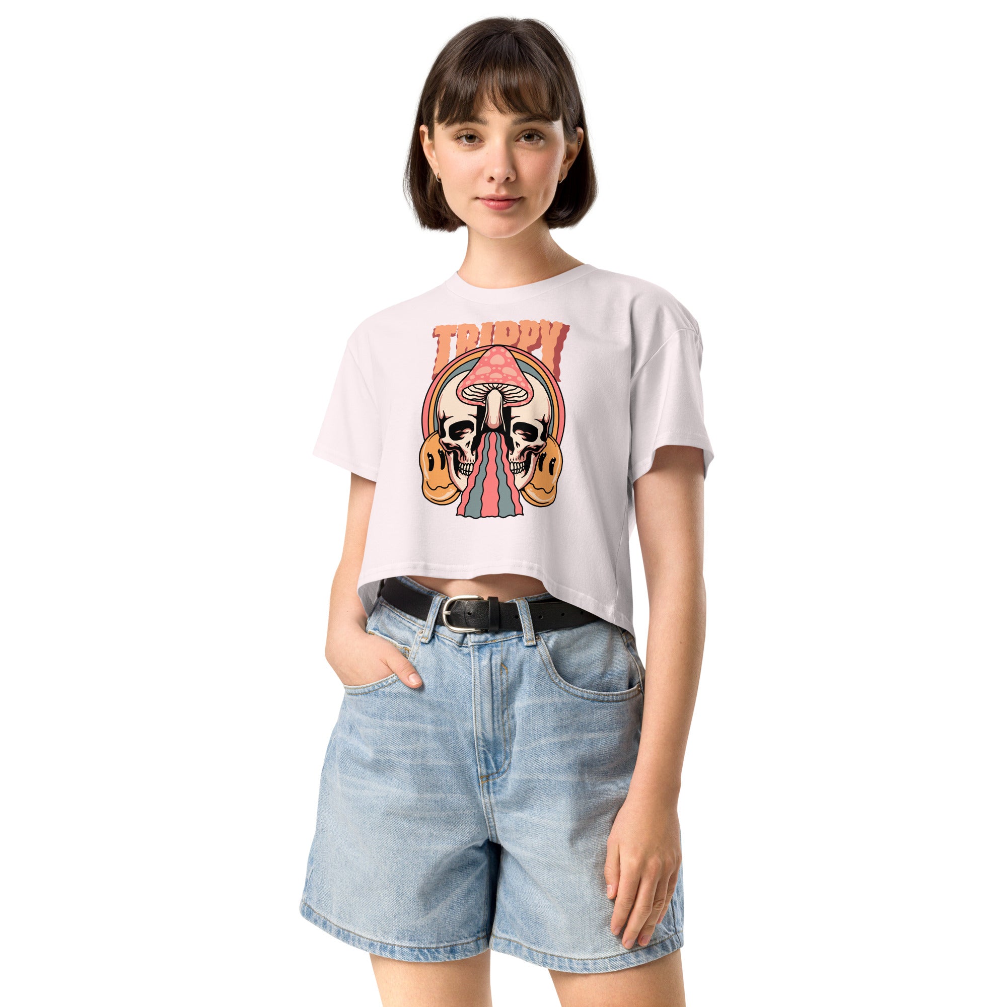 Cropped tee featuring a split skull and mushroom design with melting psychedelic color and smiley faces. Soft combed cotton, eco-friendly inks, playful surreal vibe.