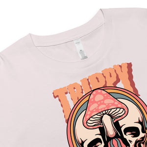 Cropped tee featuring a split skull and mushroom design with melting psychedelic color and smiley faces. Soft combed cotton, eco-friendly inks, playful surreal vibe.