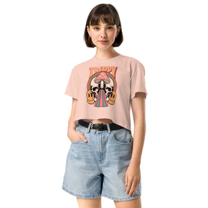 Cropped tee featuring a split skull and mushroom design with melting psychedelic color and smiley faces. Soft combed cotton, eco-friendly inks, playful surreal vibe.