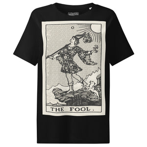 Fitted organic cotton t-shirt featuring The Fool tarot card illustration in high-contrast woodcut rendering.