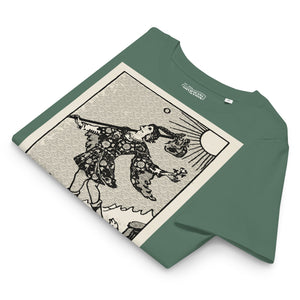 Fitted organic cotton t-shirt featuring The Fool tarot card illustration in high-contrast woodcut rendering.