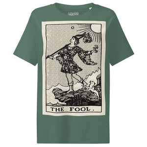 Fitted organic cotton t-shirt featuring The Fool tarot card illustration in high-contrast woodcut rendering.
